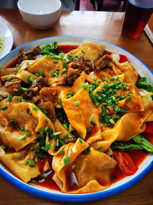 新疆木垒羊肉焖饼为何这么香？-第2张图片-花冠旅游服务