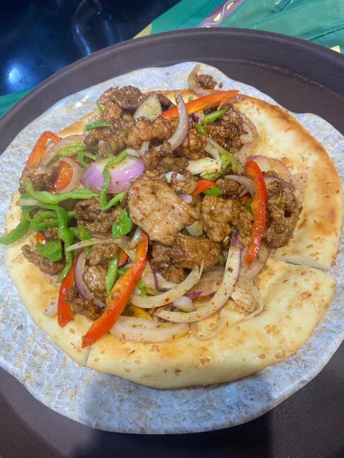 正宗新疆馕包肉怎么做才地道？-第1张图片-花冠旅游服务